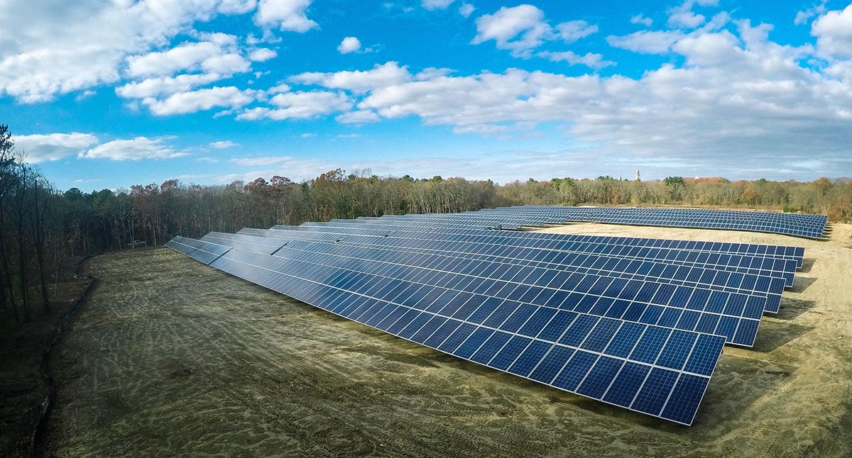 Rows of solar panels in a field