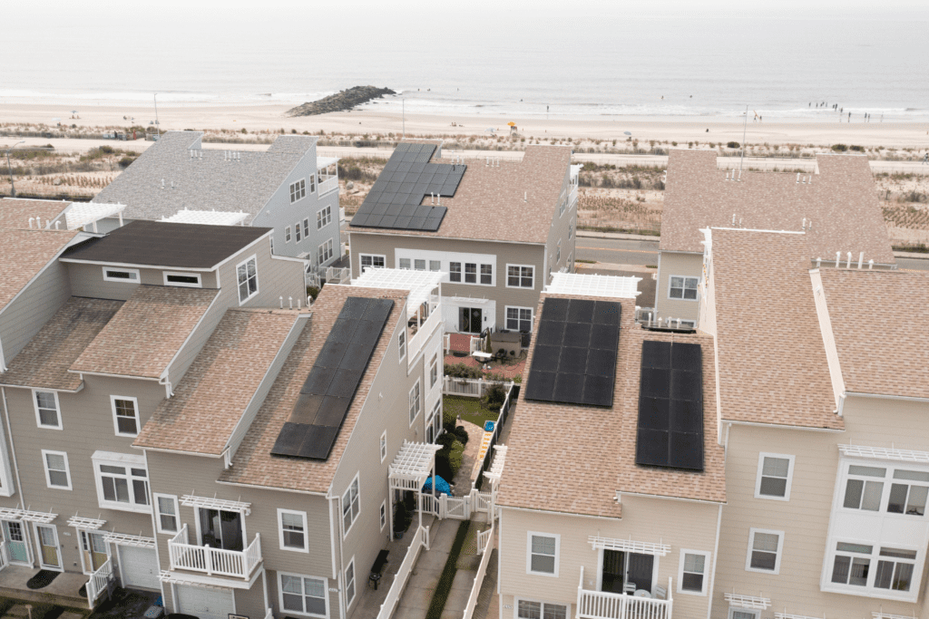 Solar panels on the roof of a house near the ocean in Arverne by the Sea, Queens, New York.