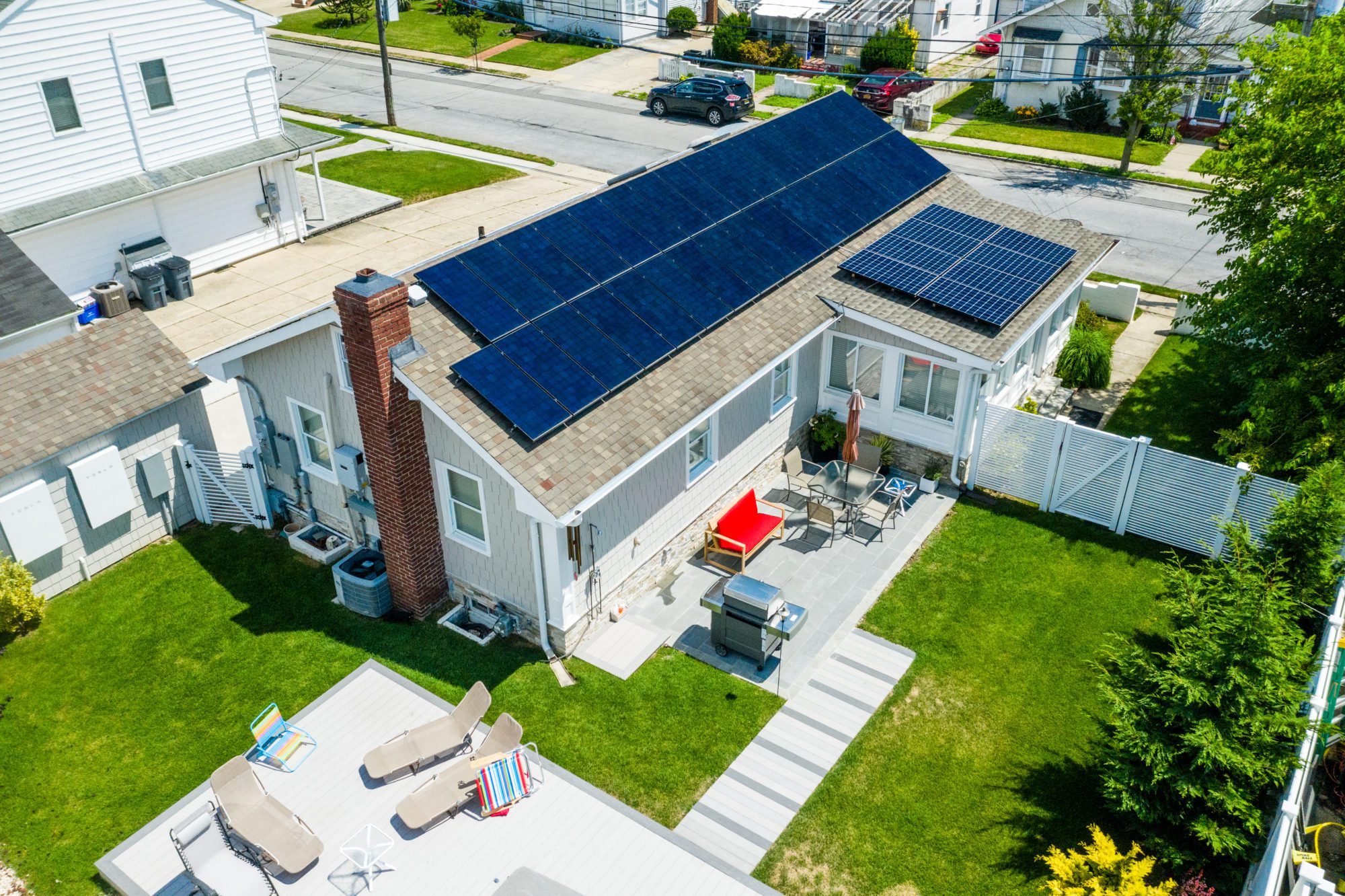 A house on Long Island has solar panels on the roof. Fall is the perfect time to learn more about renewable energy and go back to school with solar.
