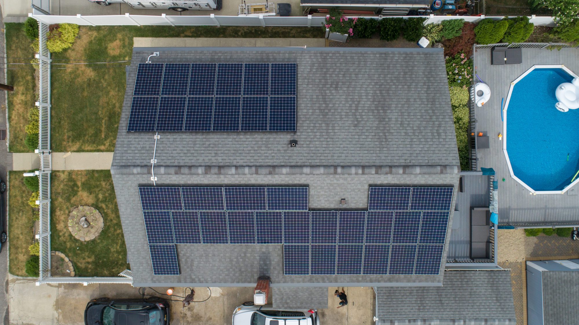 A home on Long Island with solar panels. Many clients have questions about how to pay for home solar.